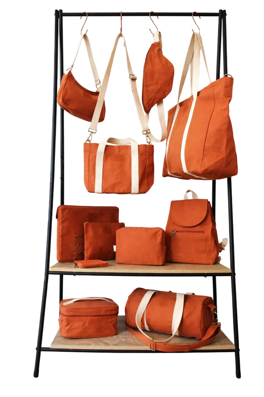 Attal Plastics bags, backpacks and totes on display rack